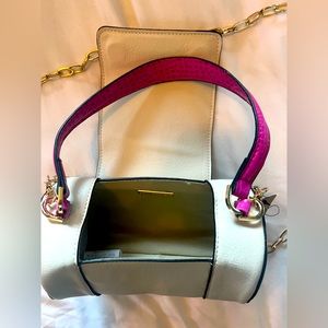 NWT off white leather like handbag with pink textured handle